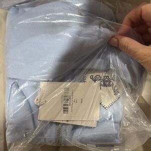 Light Blue Hoodie with Embroidered Patch